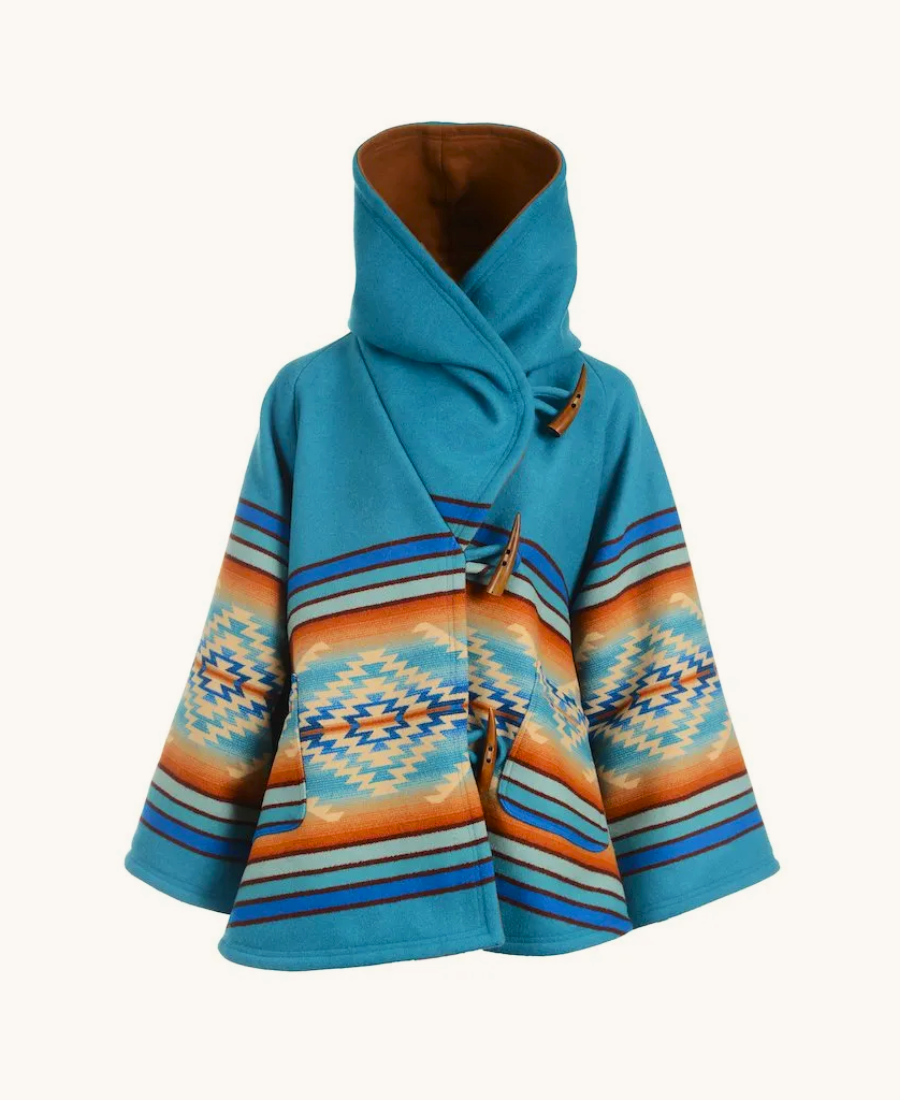 Beth Dutton Iconic Blue Coat Yellowstone Blue patterned jacket with a hood on a white background