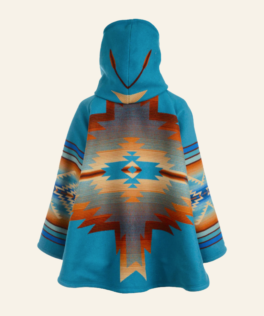 Beth Dutton Blue hooded poncho with geometric pattern