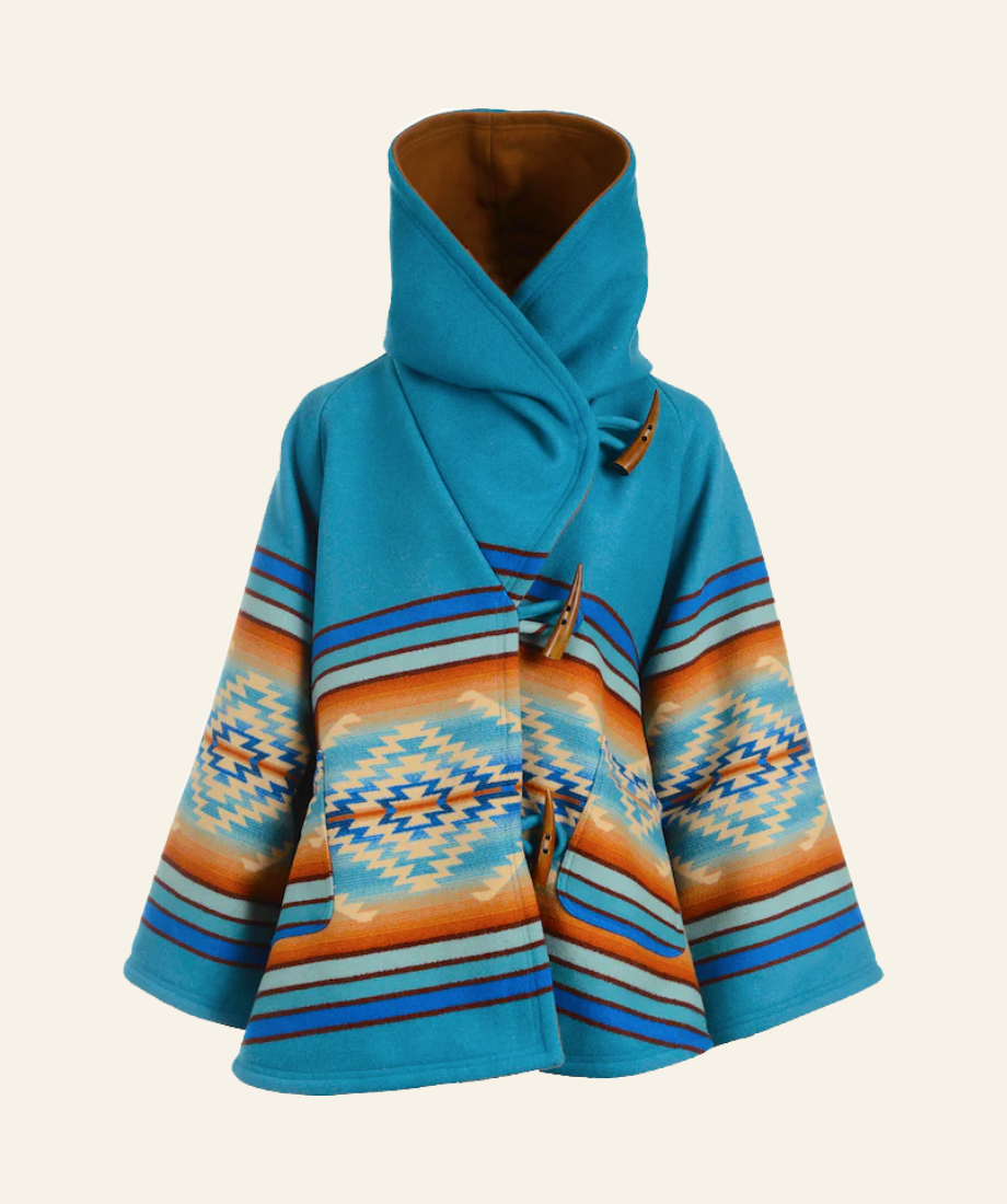 Beth Dutton YellowStone Blue coat jacket with a hood on a beige background