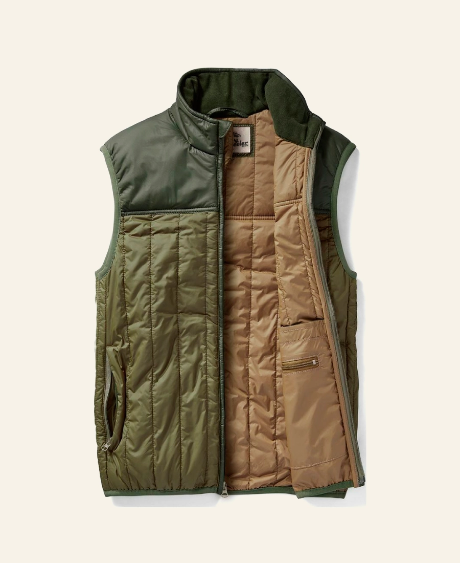 Rip Wheeler Two-tone vest with green and brown sections on a light beige background